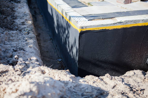 Professional Emergency Waterproofing technician working in Stanton, MI